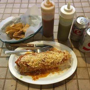 Burrito suizo dinner with a can of soda (one can was gratis), $11.60 with tax.