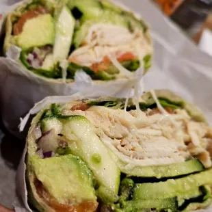 Veggie sandwich with chicken breast.