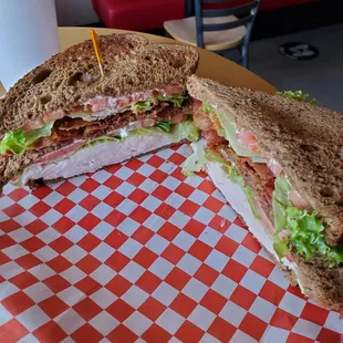 The Izzo Club on Squaw bread with mounds of Turkey and Beacon