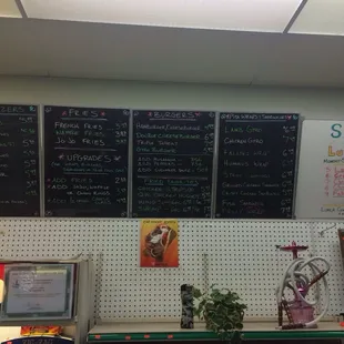 menus on the wall of a store