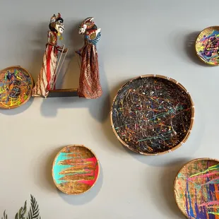 a variety of decorative objects on a wall