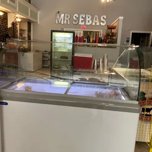 a counter with a variety of food items