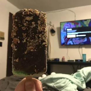 Frozen popsicles stay frozen long enough to take a bunch home with me! Pistachio ice cream dipped in chocolate covered in nuts. So good!!