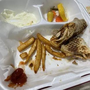  a meal in a styrofoam container