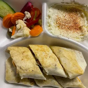 Chicken shawarma wrap! Delicious! Also came with fries!
