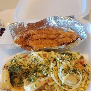 Crawfish pasta with huge shrimp plus catfish filet