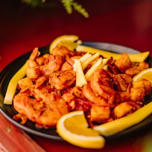 a plate of shrimp and fries