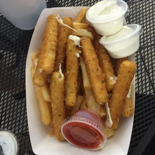 Mozzarella sticks and a bunch of fries