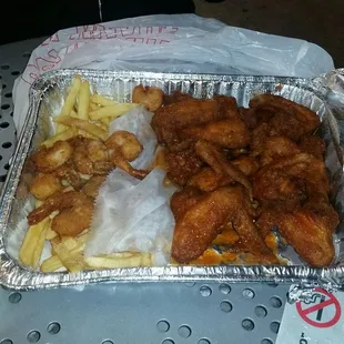 $16.99 - 3 Items Platter - 2 orders of whole wings, 1 order of shrimp, and fries.  FEEDS 3 TO 4 PEOPLE.  So tasty!!!