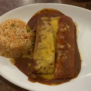 Part of the Norman dinner - cheese enchilada, tamale, rice