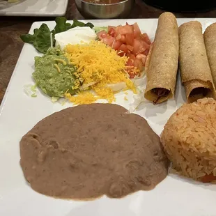 Flautas with taco salad queso on the side