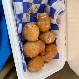 Dough balls (I forgot the name) covered in honey and sugar