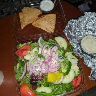Greek salad, to go. Comes w pita, tzatziki and a really tasty creamy Greek dressing.