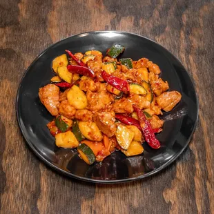 a plate of stir fried vegetables