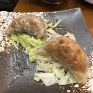 Pan fried or steamed pork w.leek dumplings