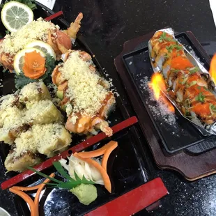 Salmon crunch roll, fried Crazy California roll, OMG roll and the Baked salmon on