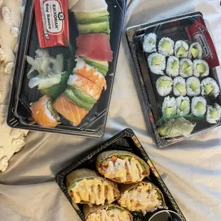 Tempura Rainbow Roll, Tasty Inari Roll (I already ate one lol) half tuna half imitation crab, and an Avocado Roll.