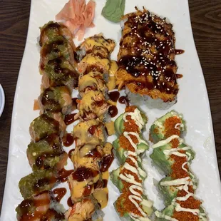 8 Pieces Southwestern Roll (far left), 8 Pieces Crazy California (2nd to left),  volcano (top right), *Hawaiian