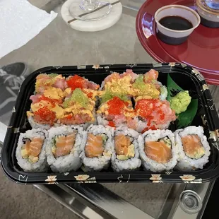 Kamakazi Roll on top; spicy salmon roll on the bottom