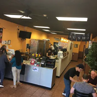 a group of people in a restaurant
