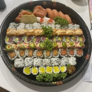 If you order enough rolls to go, you just might get them served in this awesome giant container