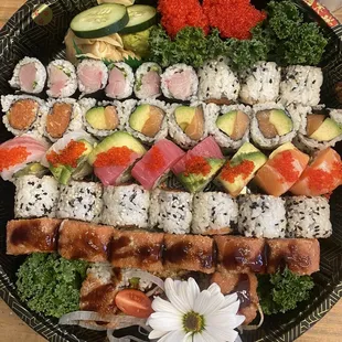 Yellow tail scallion, spicy tuna , delux rainbow roll, salmon Avo, tobiko nigiri , Tokyo roll.