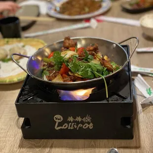 Iron pot w/fresh frog