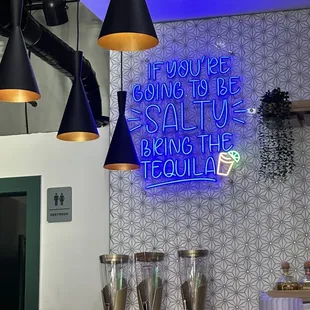 a neon sign in a restaurant