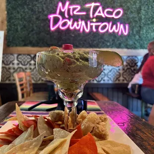 Guacamole with chips &amp; fresh pork skins! Super good! Made fresh!!!