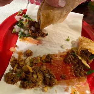 Beef taco -   Not sure about all the " juices   ".  Be sure not to ask .... You'll be cut off and told that's what you ordered.