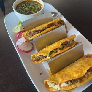 The Birria tacos were very flavorful! The consommé was sooo good!