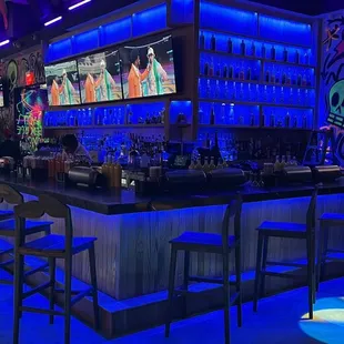 a bar with neon lights