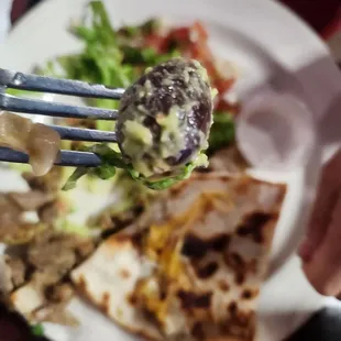 There wasn't much guacamole left on the plate once the pit was removed from the scoop.