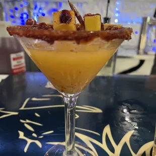 a cocktail with bacon and pineapple