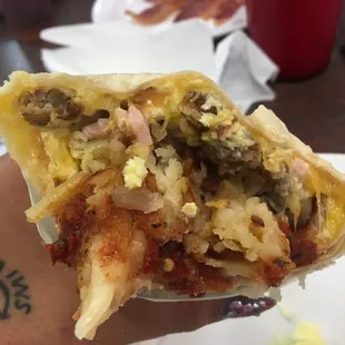 Breakfast is served all day &amp; this is their fully loaded Breakfast burrito!
