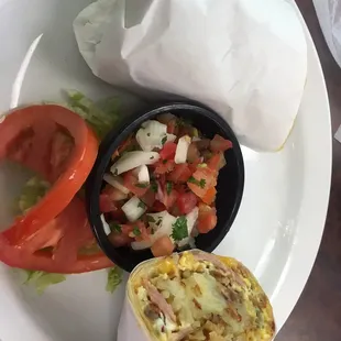 Ham, Bacon &amp; Sausage breakfast burrito with hash browns, cheese &amp; eggs.  They have 2 fresh salsas Rojo &amp; Verde just ask. Bomb!