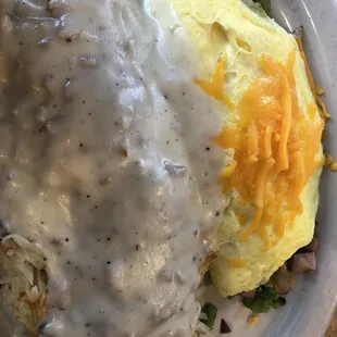 Denver omelette with hashbrowns covered in gravy