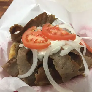 This is gyro happiness. If you can barely see the pita under the meat, it&apos;s made right.