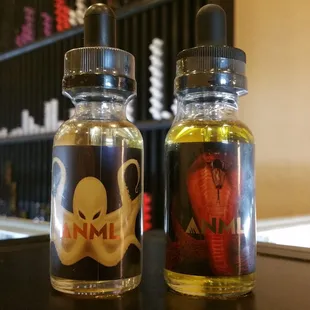 ANML. Great juice line.  Carnage is a red licorice and Looper is a cereal flavor. Both on point mixed by Phillip Rocke.