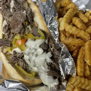 Clark Kent steak hoagie loaded sautéed onions peppers and mushrooms
