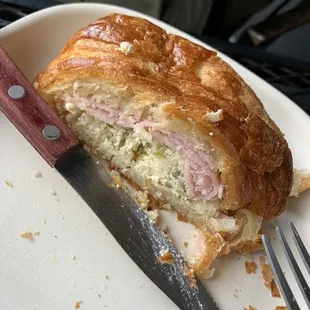 Weirdly cold crumbly filling inside a hot flaky croissant not remotely worth $13