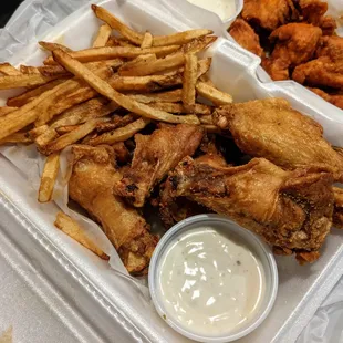 6-piece lemon pepper wings + fries and ranch dressing and a drink (not pictured). $11.25.