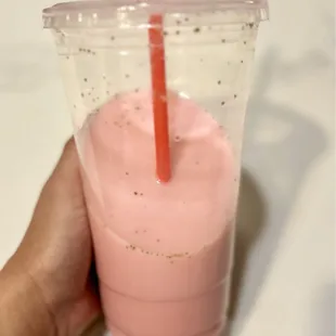 Creamy agua de fresa (strawberry) half way gone, ice is melted cuz it was 95 degrees out.