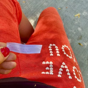 a person holding a piece of paper
