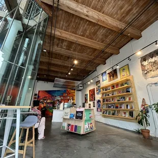 Features books and local art for sale