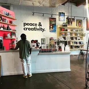 a man standing at the counter