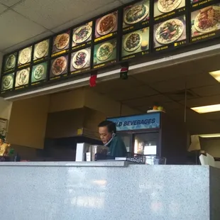 This is pretty much is a take out joint only. I came here specifically because of the reviews.Large menu. For prices.  We&apos;ll see