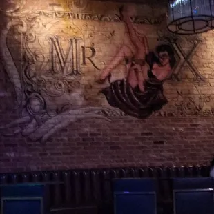  a mural of a woman on the wall