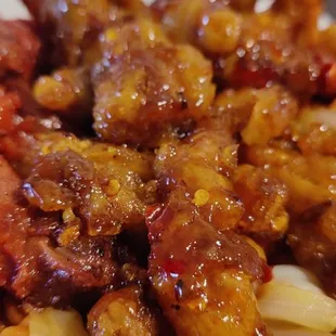 Julie was so nice. You could tell she enjoys working here. Spicy orange chicken and BBQ chicken. BBQ is sweet.