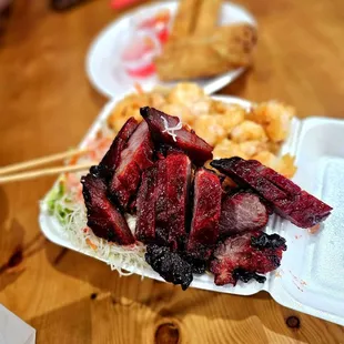 a plate of meat on a table
